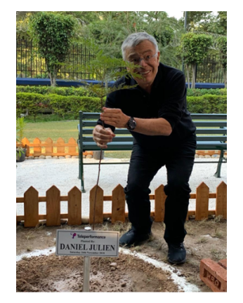 Daniel Julien planting trees